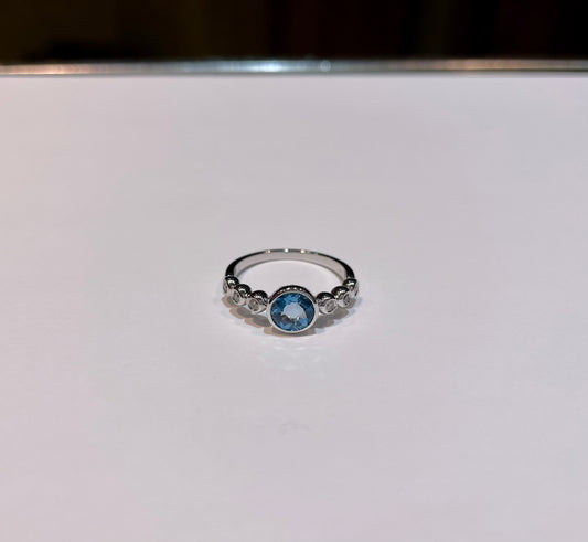 Bezel Set Blue Topaz And Diamond